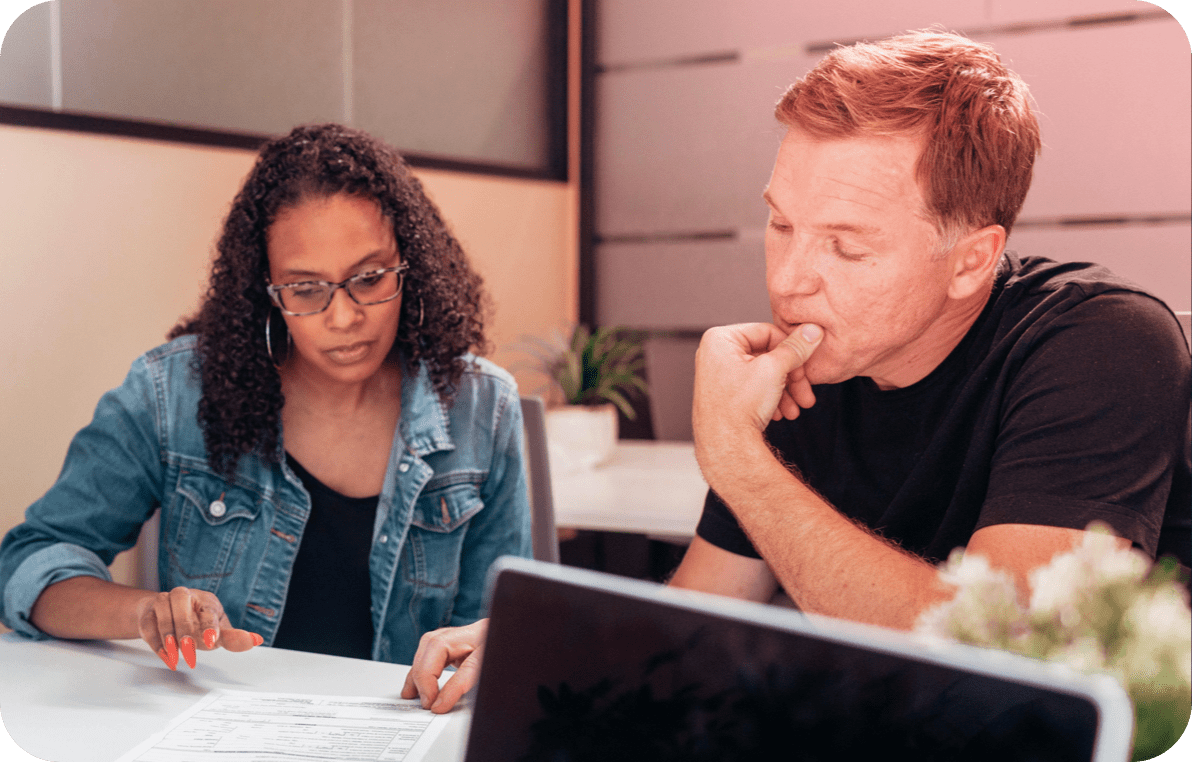 Two people completing the LPA application forms together with Power of Attorney Online's step-by-step video guide.